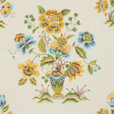 Ashford wallpaper in ochre and sky by Schumacher, featuring exuberant floral motifs in a whimsical, vintage-inspired style.