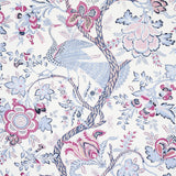 Aveline wallpaper in lilac by Schumacher featuring peacocks and flowering vines in a 19th-century Indian textile-inspired design.