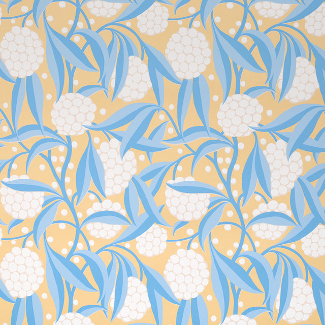 Rubus yellow painterly floral wallpaper with stylized two-tone leaves and large graphic globes of flowers by Schumacher