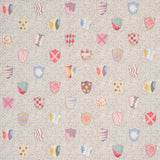 Heraldic wallpaper in Sprezzatura by Happy Menocal for Schumacher, featuring colorful painterly shields on a dotted background.