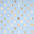 Heraldic wallpaper in Oxford Blue by Happy Menocal for Schumacher, featuring whimsical colorful shields on a mottled blue background.