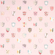 Heraldic wallpaper in pink by Happy Menocal for Schumacher, featuring whimsical colorful shields on a mottled background.