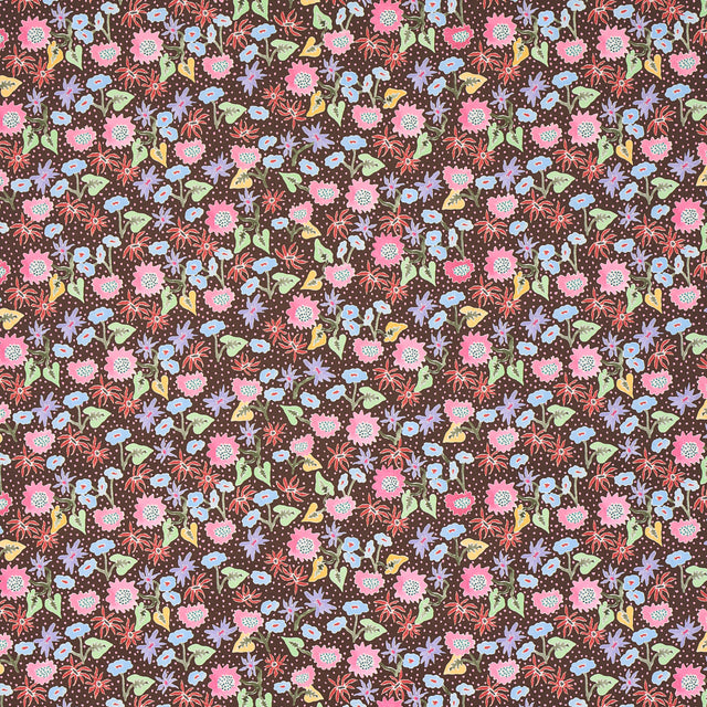 Calico by Happy Menocal for Schumacher - multicolor microfloral wallpaper in multi on brown, shown in detail and installed in a bedroom setting.