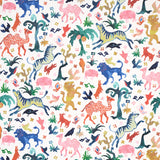 Beasts wallpaper by Happy Menocal for Schumacher, featuring a whimsical array of colorful exotic animals and flora on an ivory background.