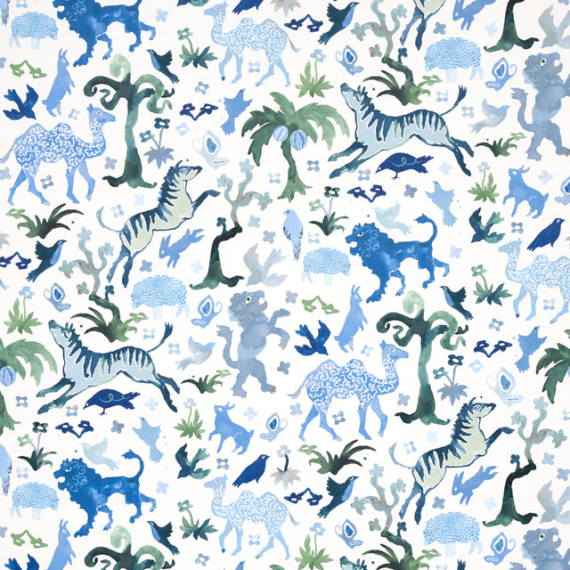 Beasts blue and green wallpaper by Happy Menocal for Schumacher featuring whimsical animals and flora in a hand-painted style