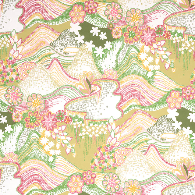 Daisy Chain wallpaper in green and pink by Clements Ribeiro for Schumacher, featuring a psychedelic floral and landscape pattern inspired by 1970s vintage prints.