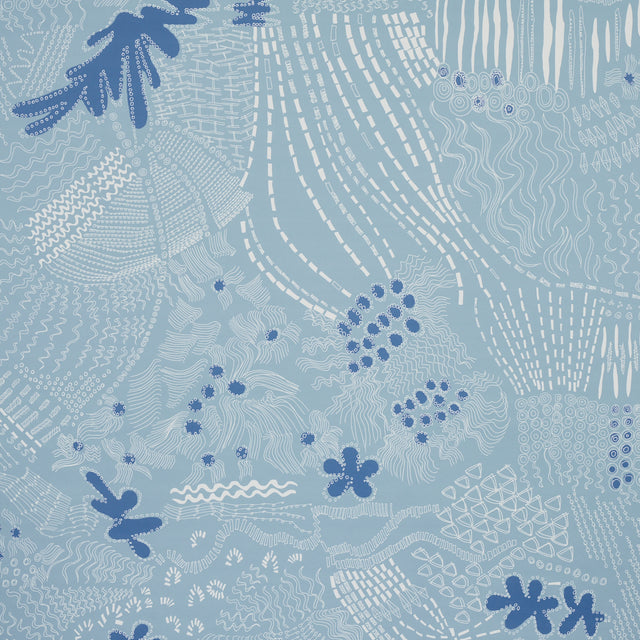 Haven wallpaper in teal and navy by Clements Ribeiro for Schumacher, featuring abstract, flowing patterns inspired by ancient drawings.