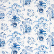 Ming Vase porcelain blue and white chinoiserie floral wallpaper by Schumacher, shown in detail and installed in a room.