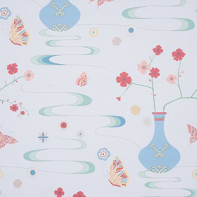 Fantasia wallpaper in Hyacinth Blue by Cristina Buckley for Schumacher, featuring whimsical vases, cherry blossoms, and butterflies in a chinoiserie style.