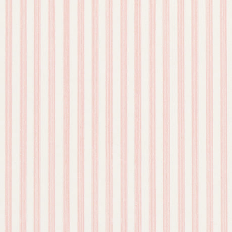 Edwin Stripe Narrow wallpaper in Petal by Schumacher, featuring narrow pink stripes on a white background, shown in a bright, classic interior setting.
