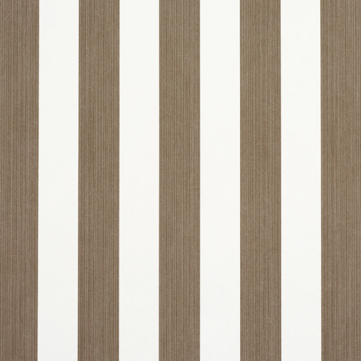Edwin Stripe Medium Mocha wallpaper by Schumacher featuring medium-width mocha and white vertical stripes, shown in a styled bedroom setting.