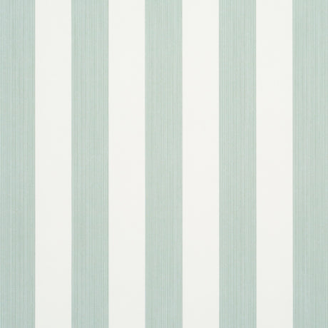Edwin Stripe Medium wallpaper in Eucalyptus by Schumacher, featuring medium-width green and white vertical stripes, shown in a styled bedroom setting.