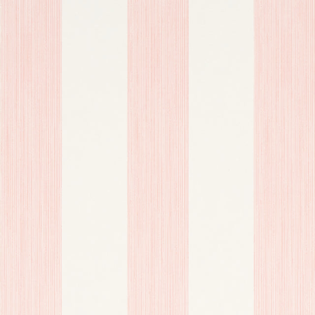 Edwin Stripe Wide wallpaper in Petal by Schumacher, featuring wide pink and white stripes, shown in a bright, classic interior setting.