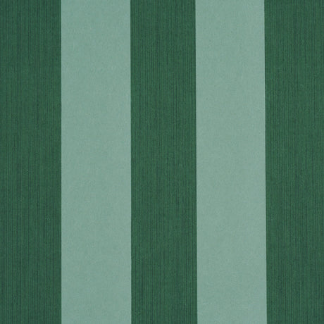 Edwin Stripe Wide wallpaper in dark green by Schumacher, featuring bold vertical stripes and a textured look.