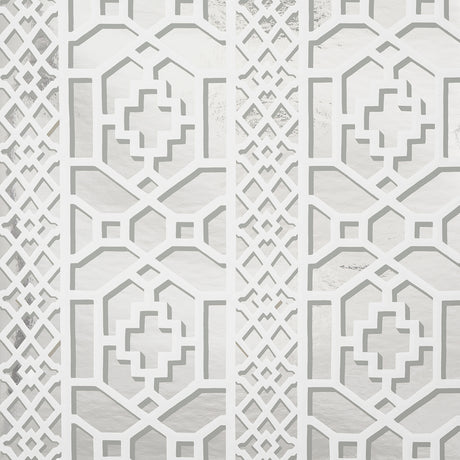 Zanzibar Trellis Mylar wallpaper in silver mylar, a glamorous geometric fretwork pattern with metallic shine by Schumacher.
