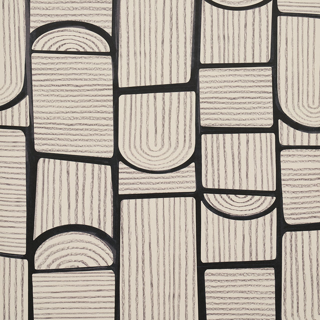 Bloomsbury Carbon by Backdrop for Schumacher. Modern geometric wallpaper with multidirectional collage of arches and rectangles in black and off-white.