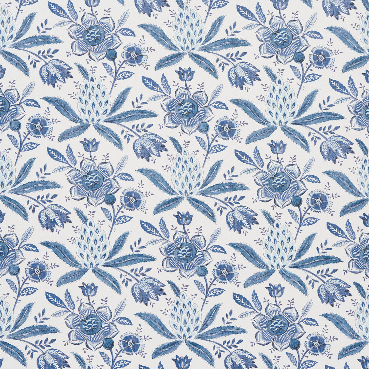Lafayette Botanical Cornflower wallpaper by Schumacher, featuring a blue floral and pineapple pattern inspired by 18th-century French chintz.