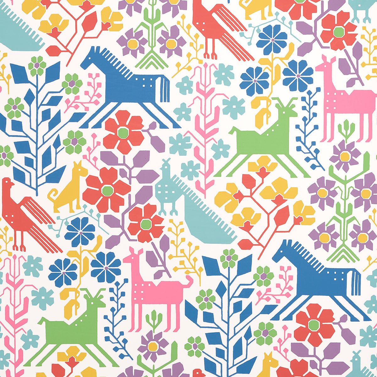LUPITA vibrant multi-color wallpaper with whimsical animals and floral motifs by Schumacher, shown in a modern interior setting.