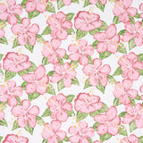 Fabienne Pink floral wallpaper by Victor Glemaud for Schumacher, featuring hand-painted hibiscus flowers and green leaves on a white background.