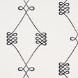 Nicolette wallpaper in black on cream, featuring a swirling trellis motif by Schumacher.