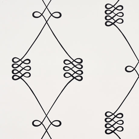 Nicolette wallpaper in black on cream, featuring a swirling trellis motif by Schumacher.