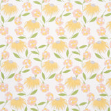 Bouquet Toss in Pink Lemonade by Celerie Kemble for Schumacher. Retro floral wallpaper with yellow and pink blooms and green leaves on a white background.