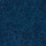 Porphyry Peacock by Miles Redd for Schumacher, a luxe gravure-printed wallpaper with a crystal-studded stone effect in deep blue tones.