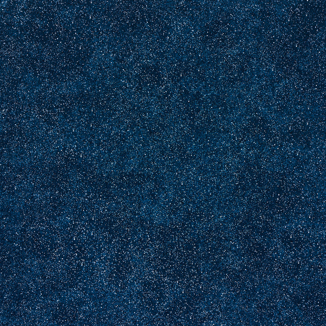 Porphyry Peacock by Miles Redd for Schumacher, a luxe gravure-printed wallpaper with a crystal-studded stone effect in deep blue tones.