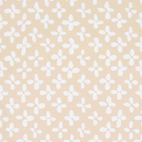 Emerson wallpaper in ivory on beige by Schumacher, featuring a small-scale quatrefoil-inspired print with a hand-painted feel.