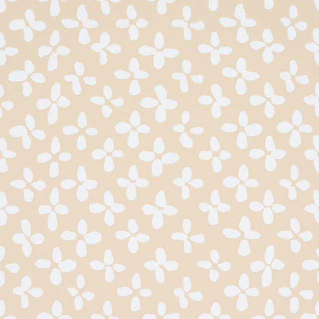 Emerson wallpaper in ivory on beige by Schumacher, featuring a small-scale quatrefoil-inspired print with a hand-painted feel.