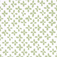 Emerson green-on-ivory small-scale quatrefoil print wallpaper by Schumacher, shown in close-up, roll, and room setting.