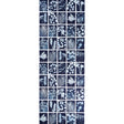Cyanotype Panel wallpaper in indigo featuring botanical silhouettes in a grid pattern by Schumacher.