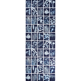 Cyanotype Panel wallpaper in indigo featuring botanical silhouettes in a grid pattern by Schumacher.