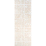 Cyanotype Panel in Natural by Schumacher features botanical silhouettes in a grid pattern, uncoated nonwoven wallcovering panel.