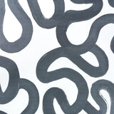 Trace wallpaper in Carbon by Schumacher, featuring a bold, gestural black and white abstract pattern designed by Hadiya Williams.