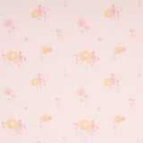Pom Pom Forest wallpaper in blush by Marie-Chantal for Schumacher, featuring a delicate small-scale floral pattern in soft pink and yellow tones.