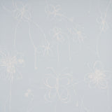 Come Back as a Flower wallpaper in Mineral by Hera Ford for Schumacher. Hand-drawn floral design in soft blue and white, shown in a modern bedroom setting.
