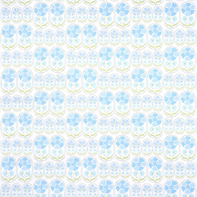 Anjuna Floral Sky wallpaper by Schumacher featuring stylized blue flowers in a hand-block print inspired by antique Suzani textiles.