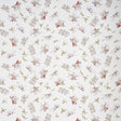 Wild West wallpaper in cream by Schumacher, featuring playful vintage cowboys and cowgirls in a whimsical Western scene.