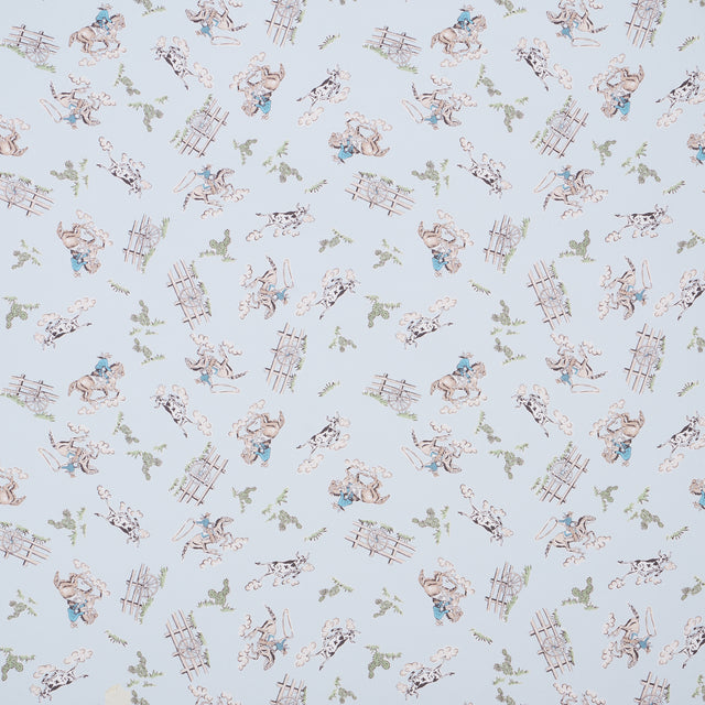 Wild West wallpaper in blue by Marie-Chantal for Schumacher, featuring playful cowboys and cowgirls in a vintage Western motif.
