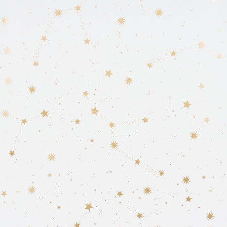 Scattered Stars wallpaper in ivory by Schumacher, featuring a constellation of metallic gold stars on a matte ivory background.