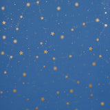 Scattered Stars wallpaper in Night by Marie-Chantal for Schumacher, featuring a constellation of metallic gold stars on a deep blue background.