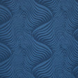 Sauvage Navy abstract animal print wallpaper by Schumacher, featuring a tonal wavy pattern in deep blue.