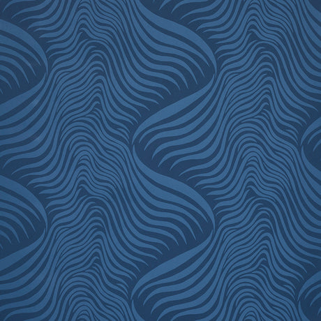 Sauvage Navy abstract animal print wallpaper by Schumacher, featuring a tonal wavy pattern in deep blue.