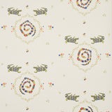 Reptilia wallpaper by Schumacher featuring playful embroidered alligators, snakes, and swamp plants in bright multi colors on a cream background.