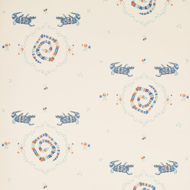 Reptilia wallpaper in warm blue by Schumacher, featuring playful embroidered alligators, snakes, and stylized swamp plants on a cream background.