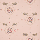 Reptilia wallpaper in muted pink with playful embroidered alligators, snakes, and floral motifs by Schumacher