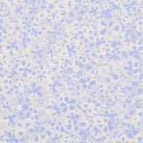 Superbloom Cornflower wallpaper by Schumacher features a hand-painted floral design in blue and white, perfect for accent walls or full-room coverage.