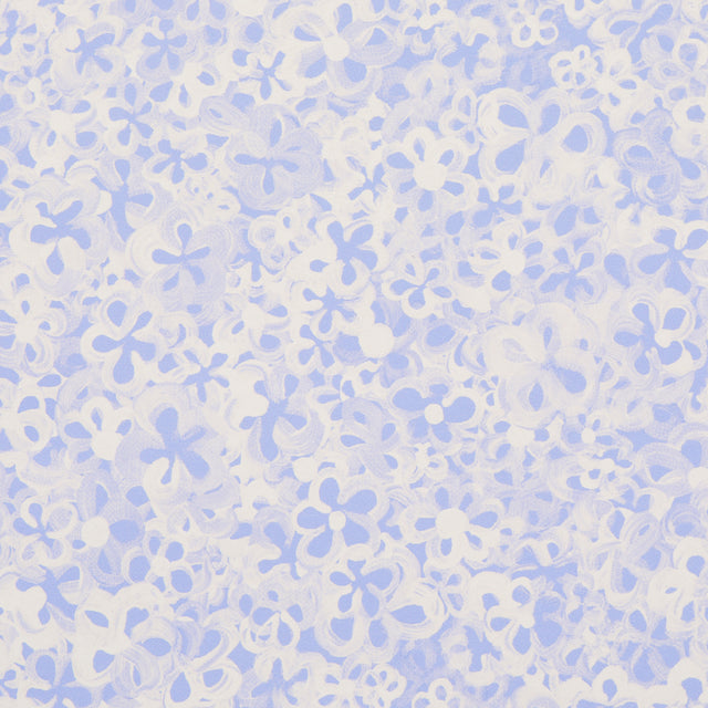 Superbloom Cornflower wallpaper by Schumacher features a hand-painted floral design in blue and white, perfect for accent walls or full-room coverage.