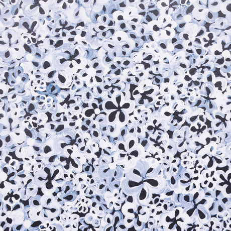 Superbloom Deep Blue by Backdrop, a small-scale floral wallpaper with hand-painted wildflowers in blue and white tones, shown in room and detail views.